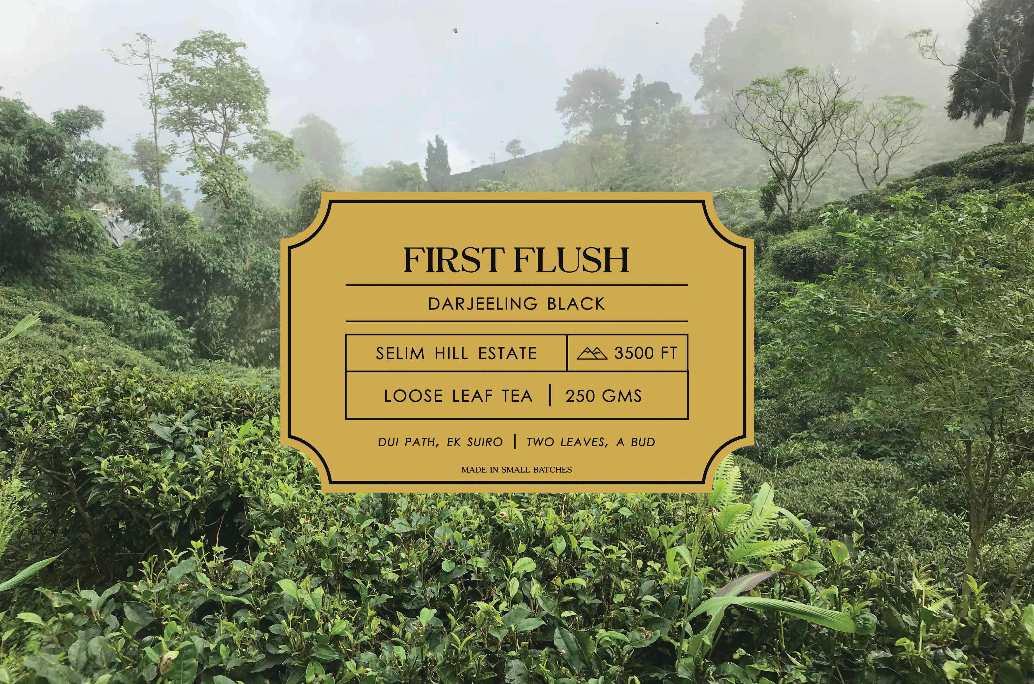 A label of Dorje First Flush tea on a backdrop of tea bushes