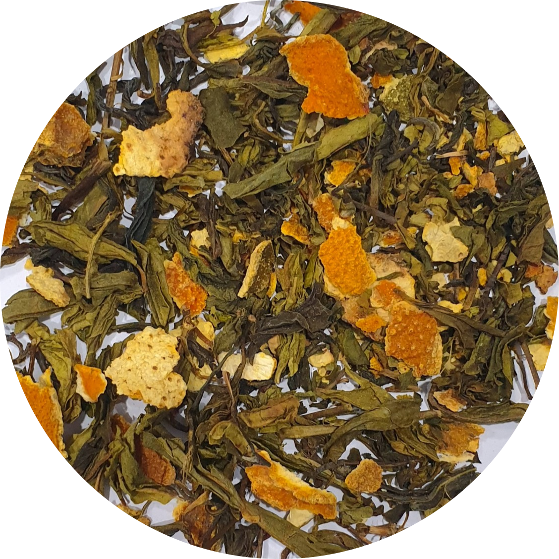 A close up of tangy orange tea with green tea leaves